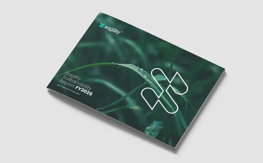A booklet titled Sustainability Report FY2025 with grass and water droplets on the cover, and a white geometric logo.