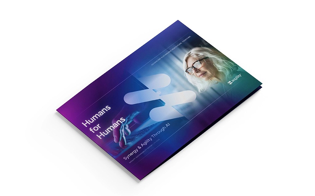 The Sagility Sustainability Report 2026 brochure cover titled Humans for Humans features a woman in glasses, a digital hand graphic, and purple gradients.